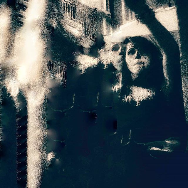 Woman in Day of the Dead facepaint performing a dance.