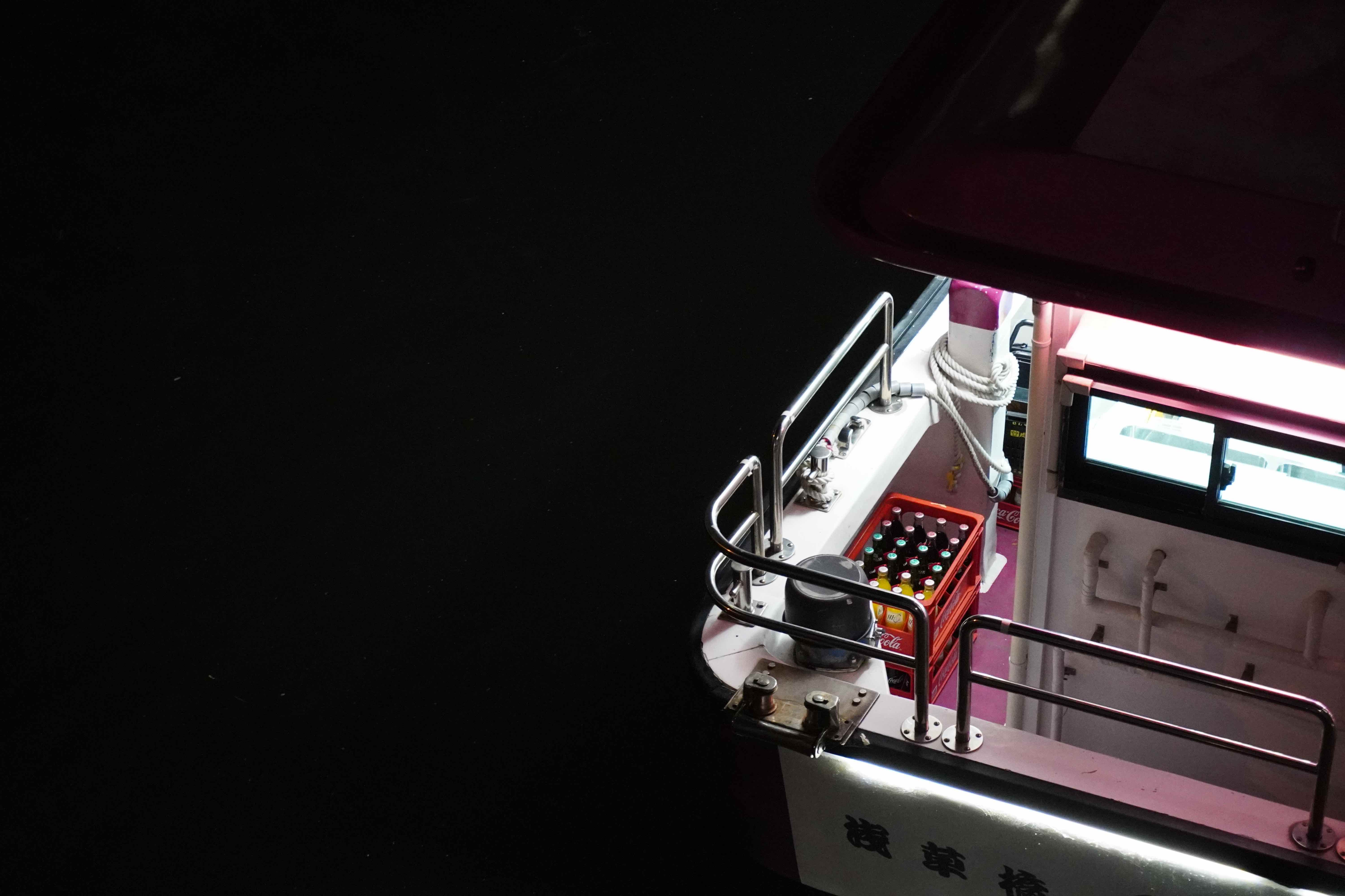 A boat on the Kanda river at night.