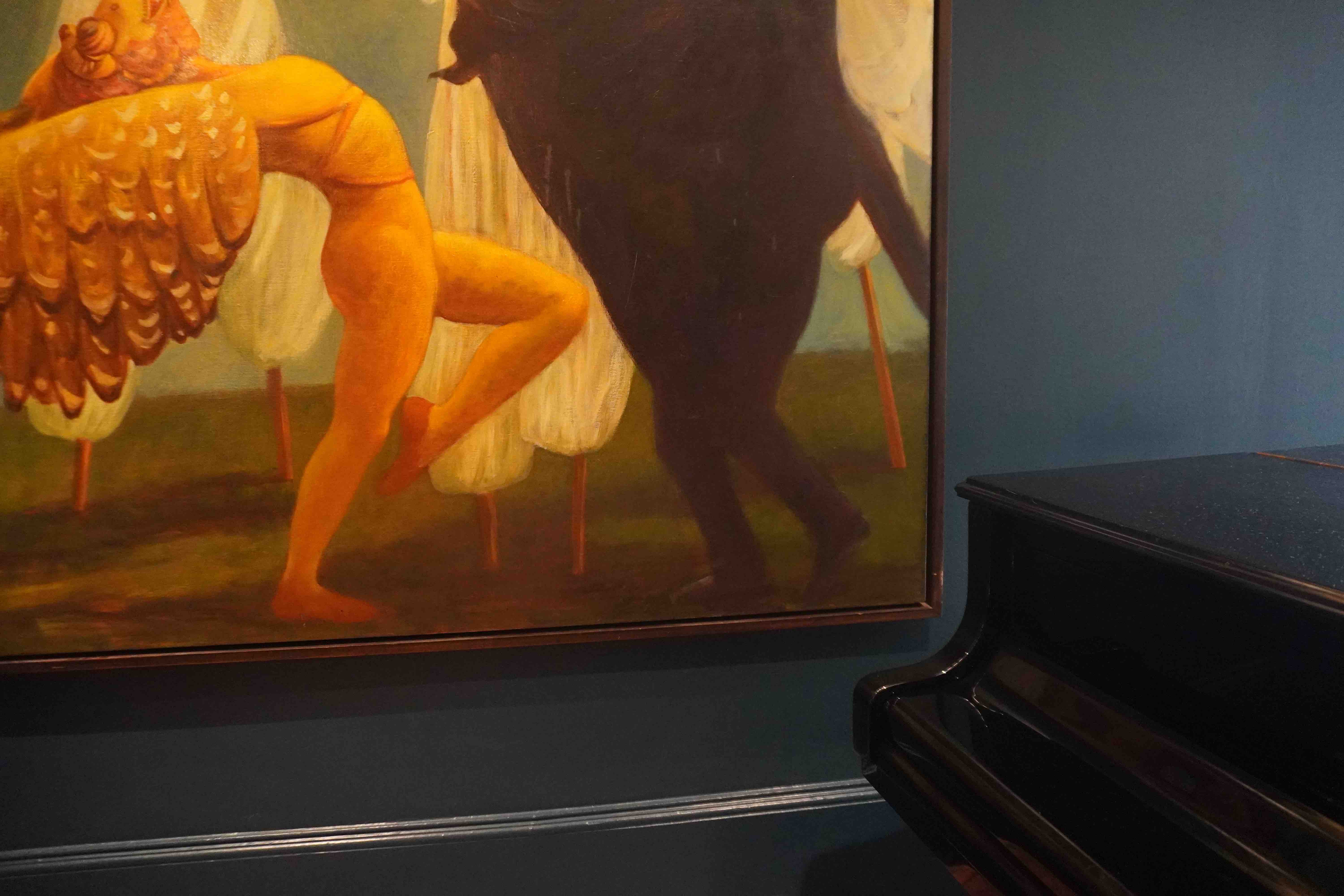 Large painting next to a piano.
